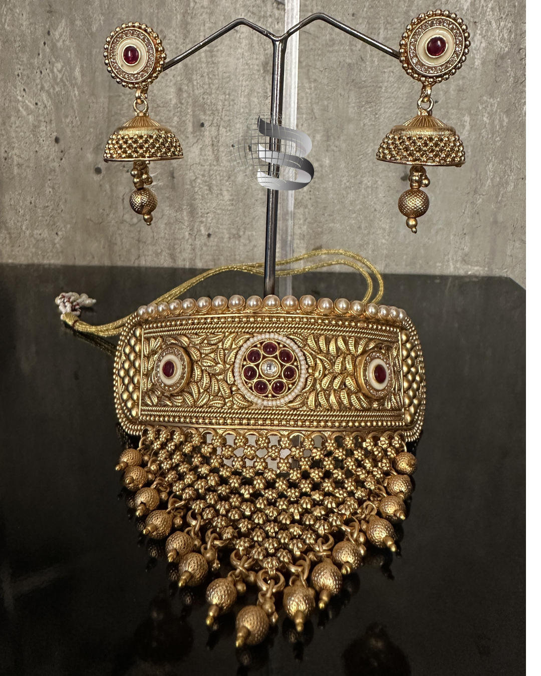 Golden Red Stone Studded Enamel and American Diamond work Choker Set