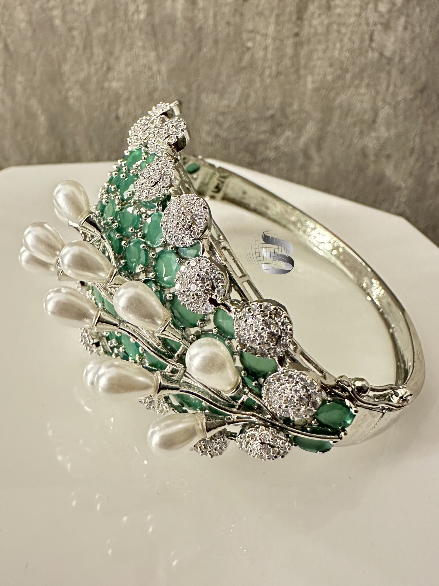 Silver Toned Mint Green Stones and American Diamonds Studded Adjustable Bracelet with 3D Pearl Work