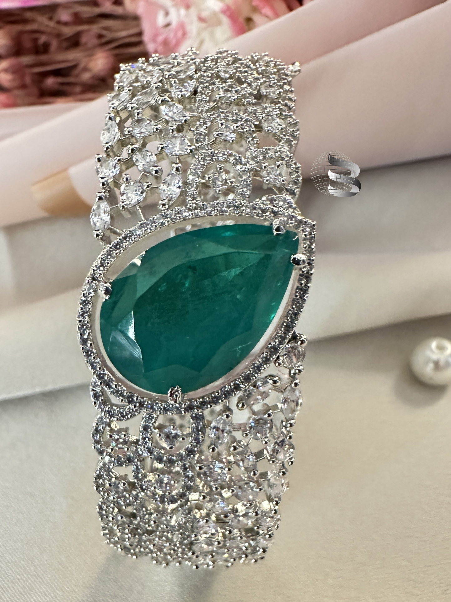 Silver-Toned American Diamond Bracelet with Emerald Centerpiece