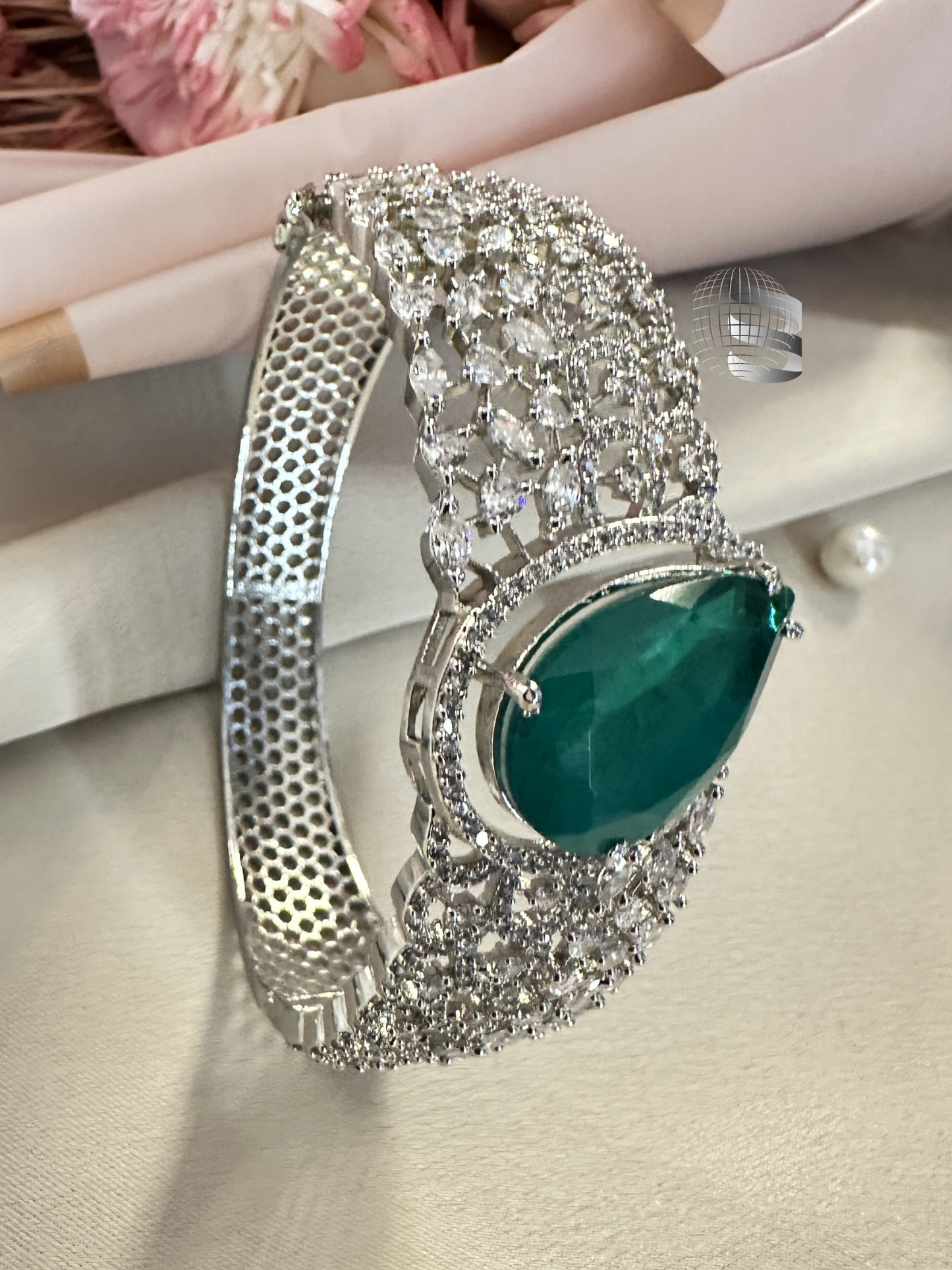 Silver-Toned American Diamond Bracelet with Emerald Centerpiece