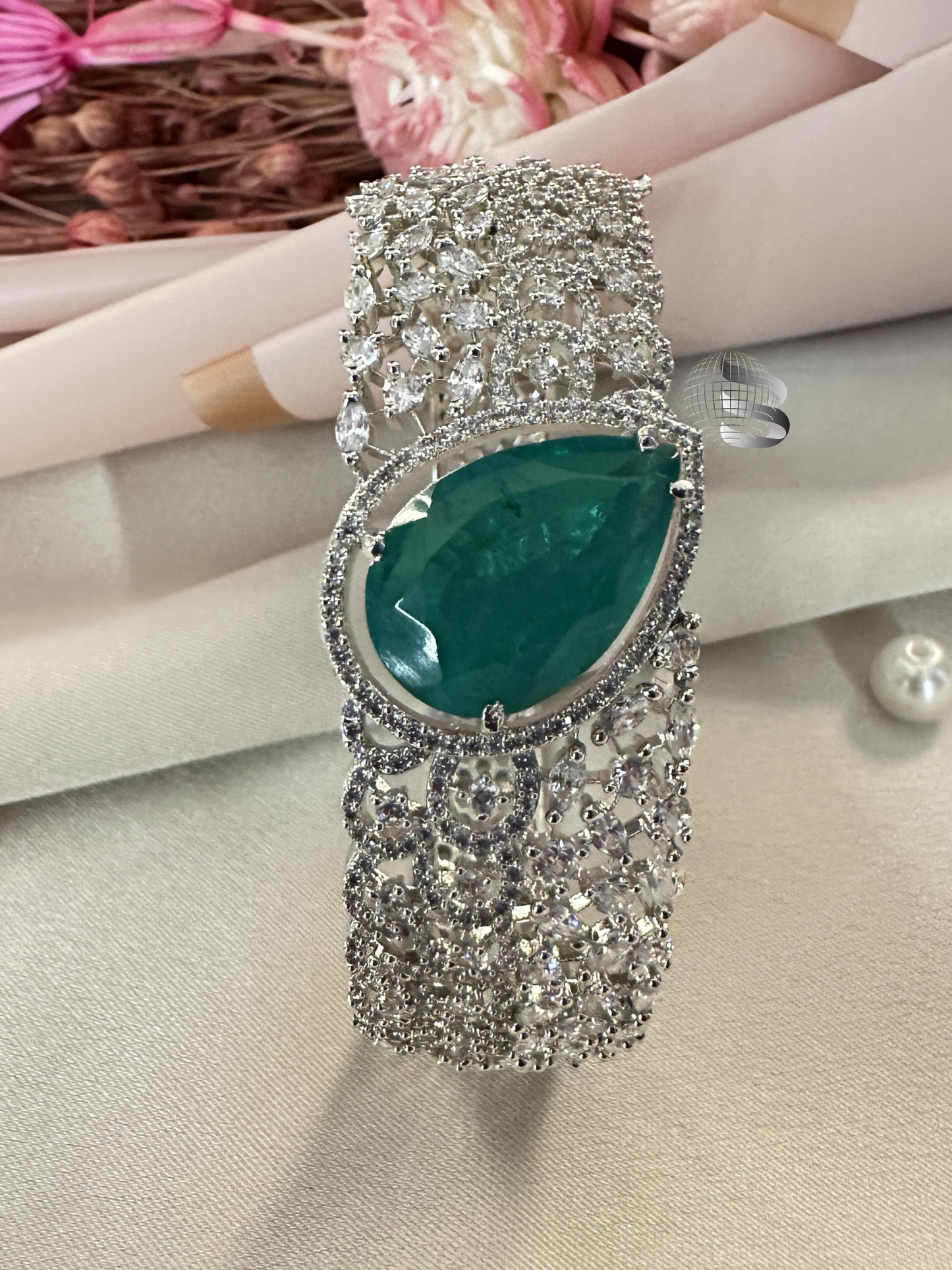 Silver-Toned American Diamond Bracelet with Emerald Centerpiece