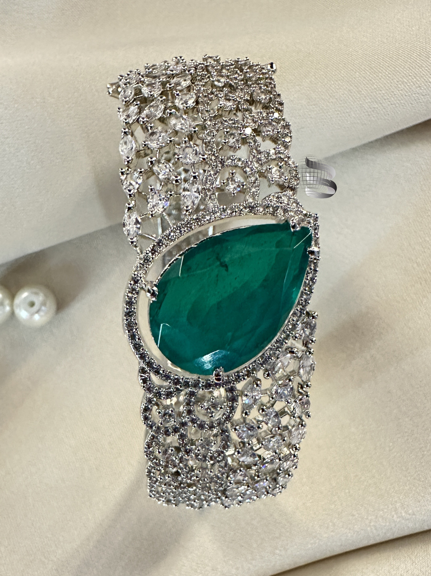 Silver-Toned American Diamond Bracelet with Emerald Centerpiece