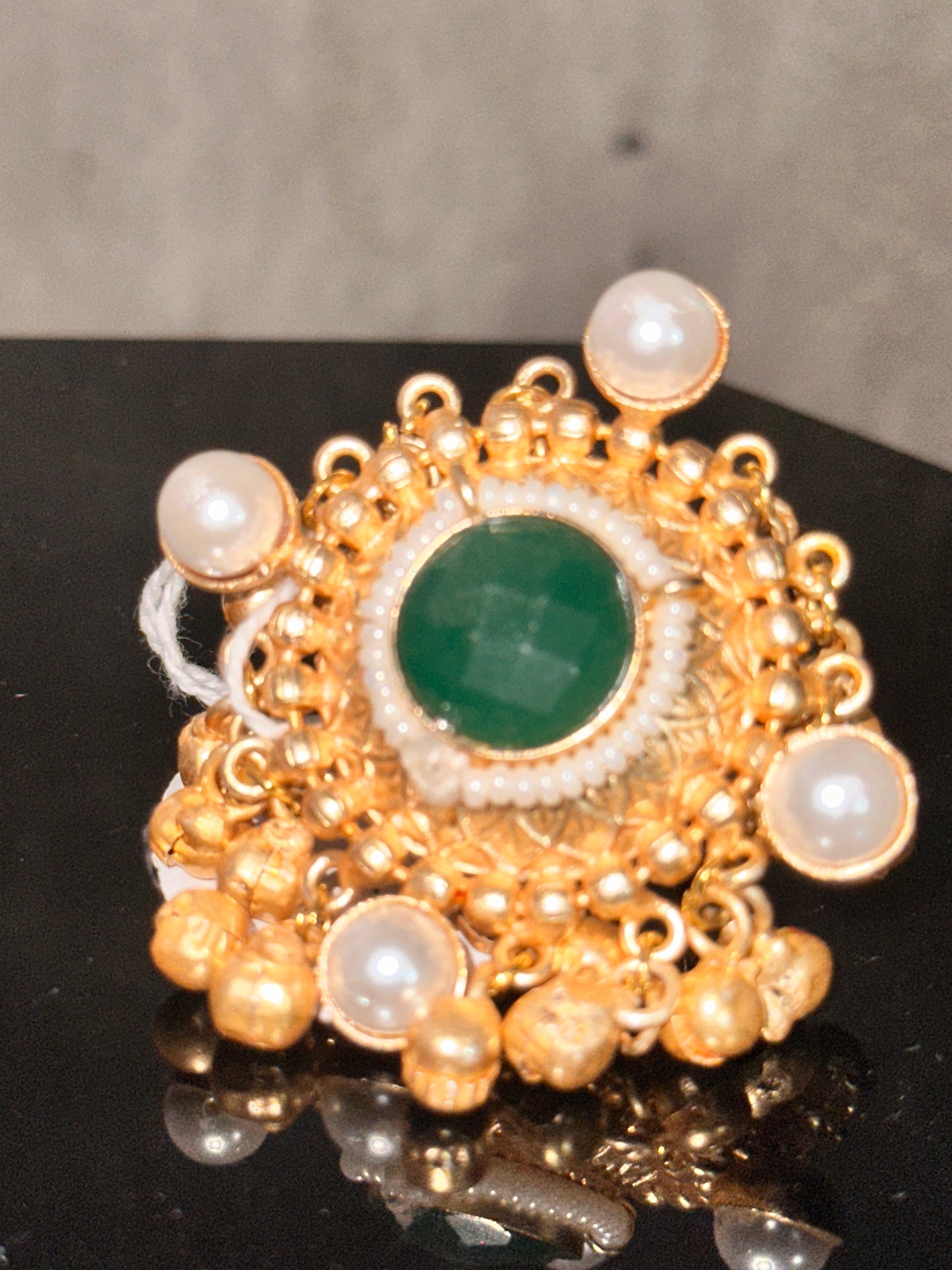 Golden Ghungroo Cocktail Ring with Green Stone as Centerpiece