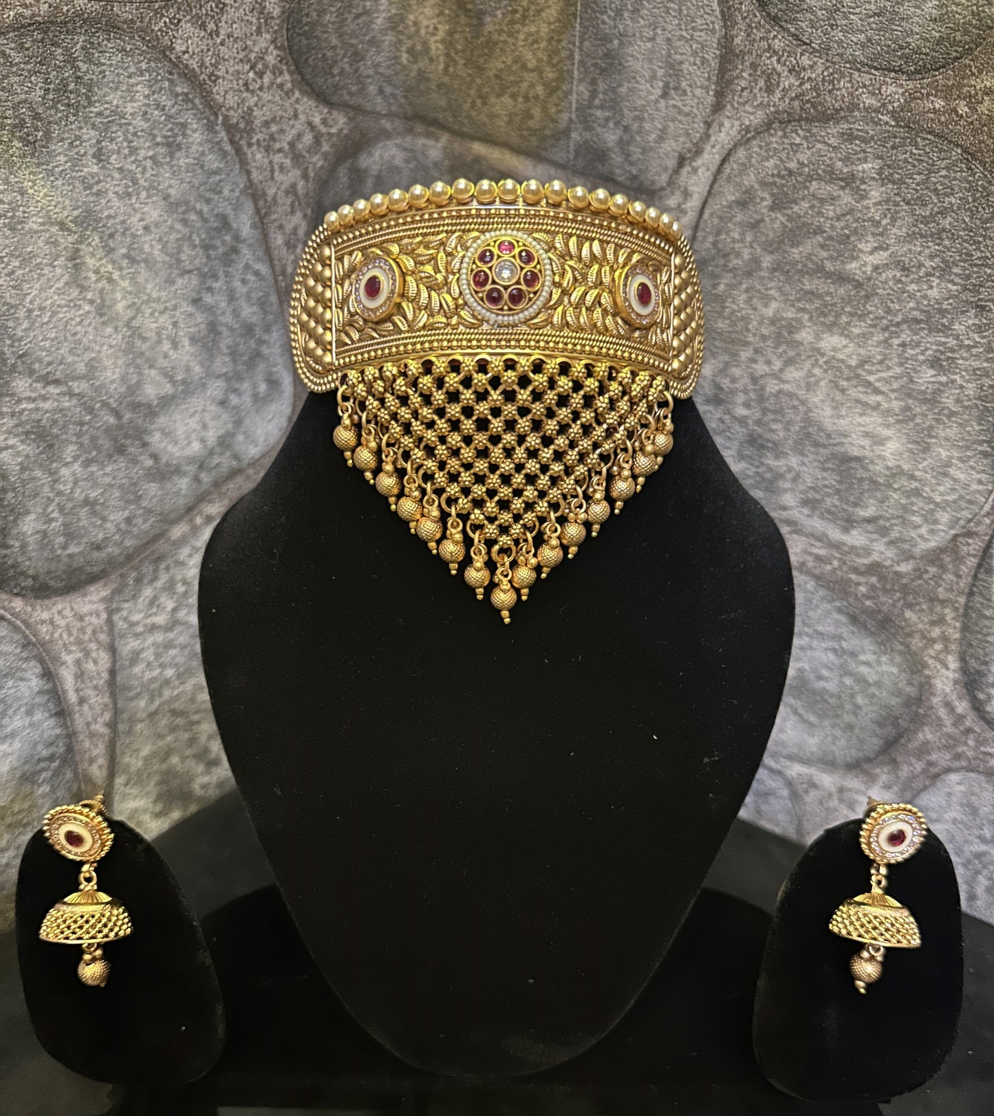 Golden Red Stone Studded Enamel and American Diamond work Choker Set