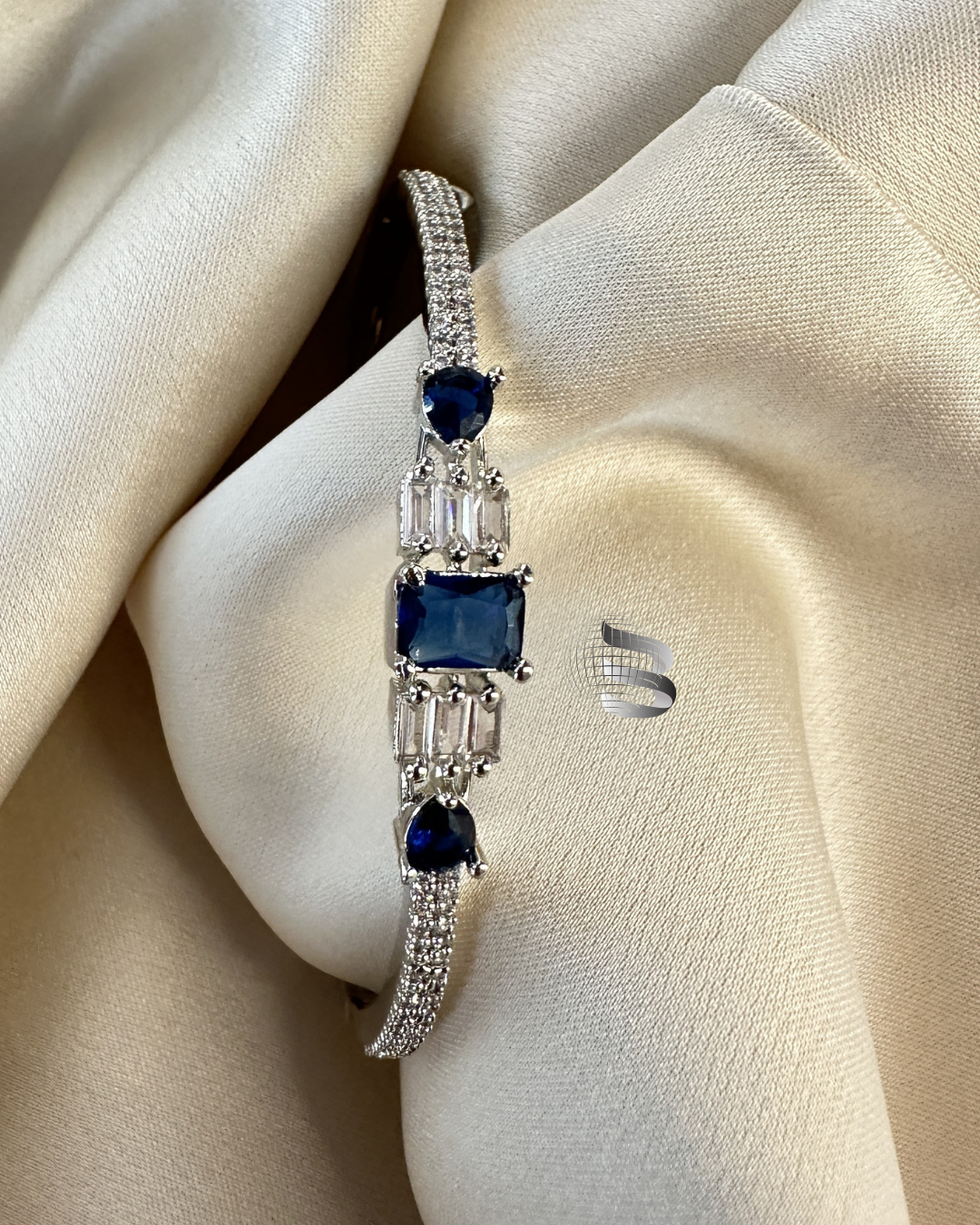 Rhodium Plated Brass American Diamond Studded Contemporary Blue Crystal Stone Studded Bracelets for Women & Girls