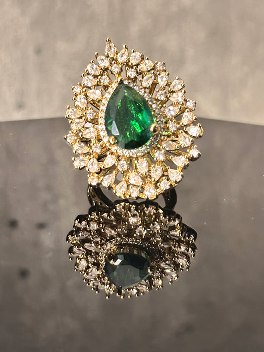 Golden American Diamond Ring with Green Stone as Centerpiece